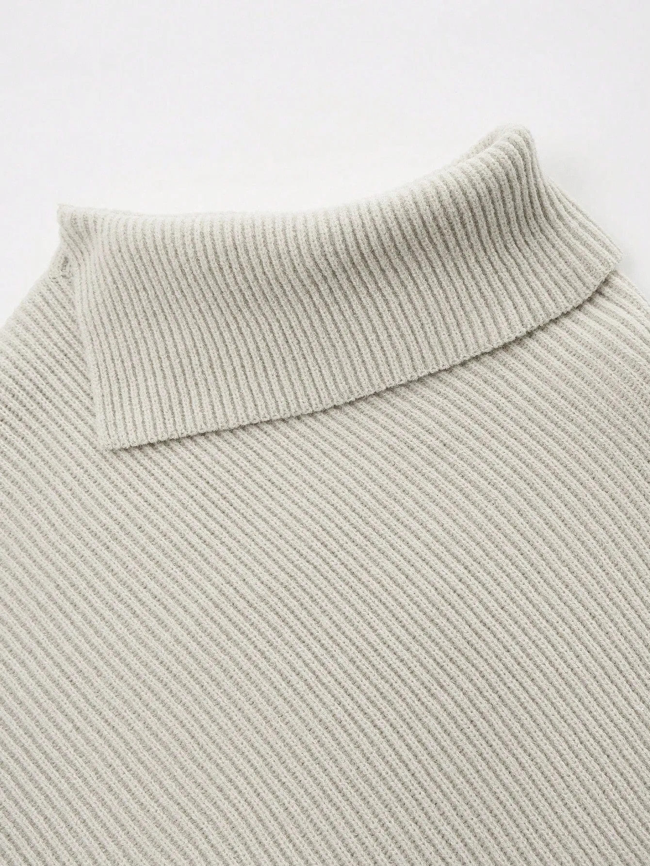 Elegante Top de Punto con Manga de Murciélago en