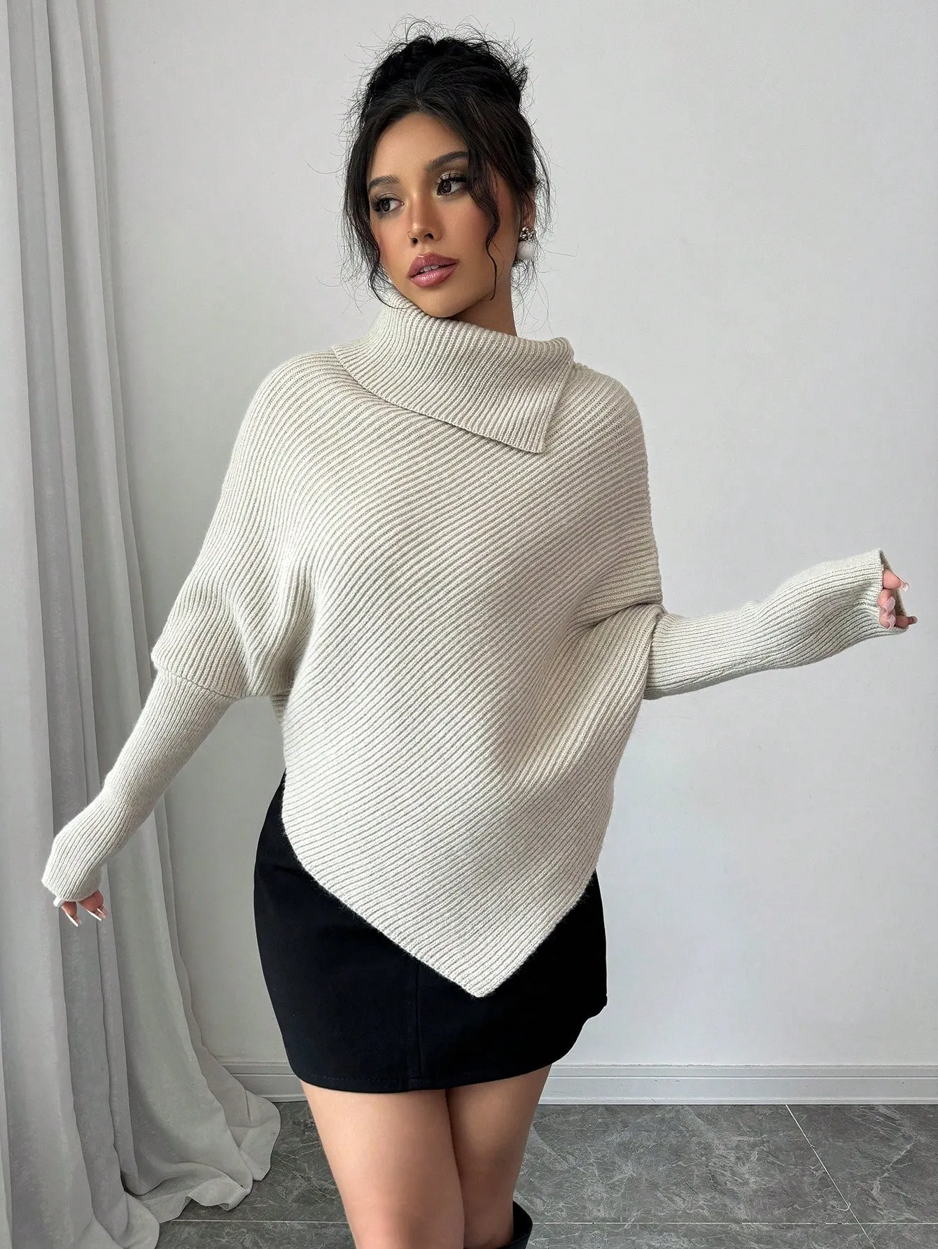 Elegante Top de Punto con Manga de Murciélago en
