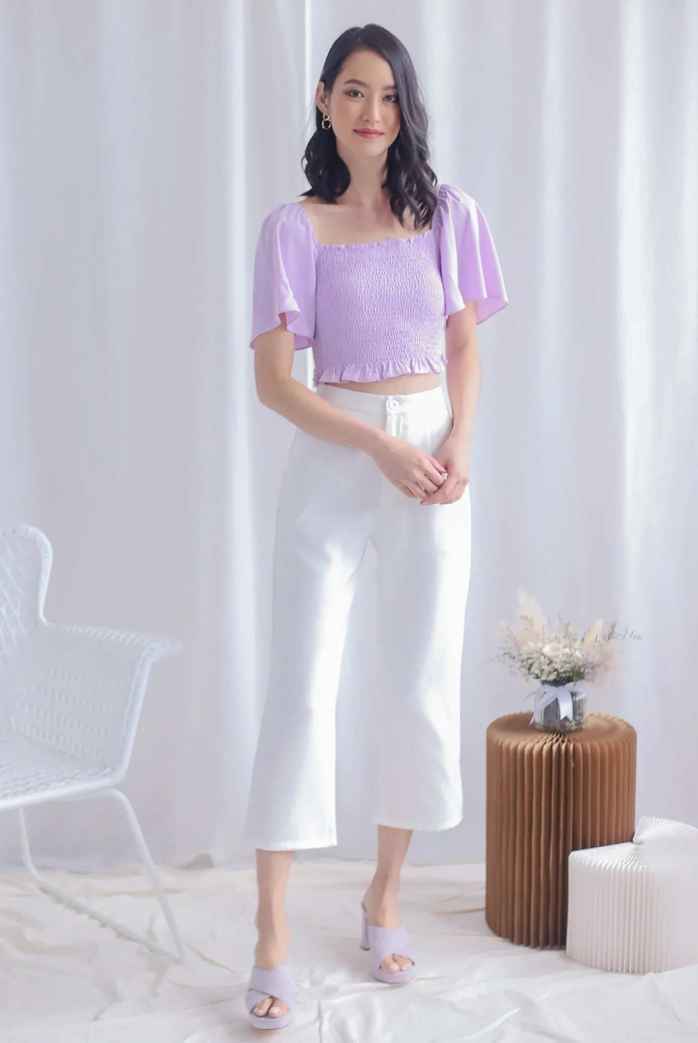 Stephi Flutter Sleeve Smocked Top In Lilac